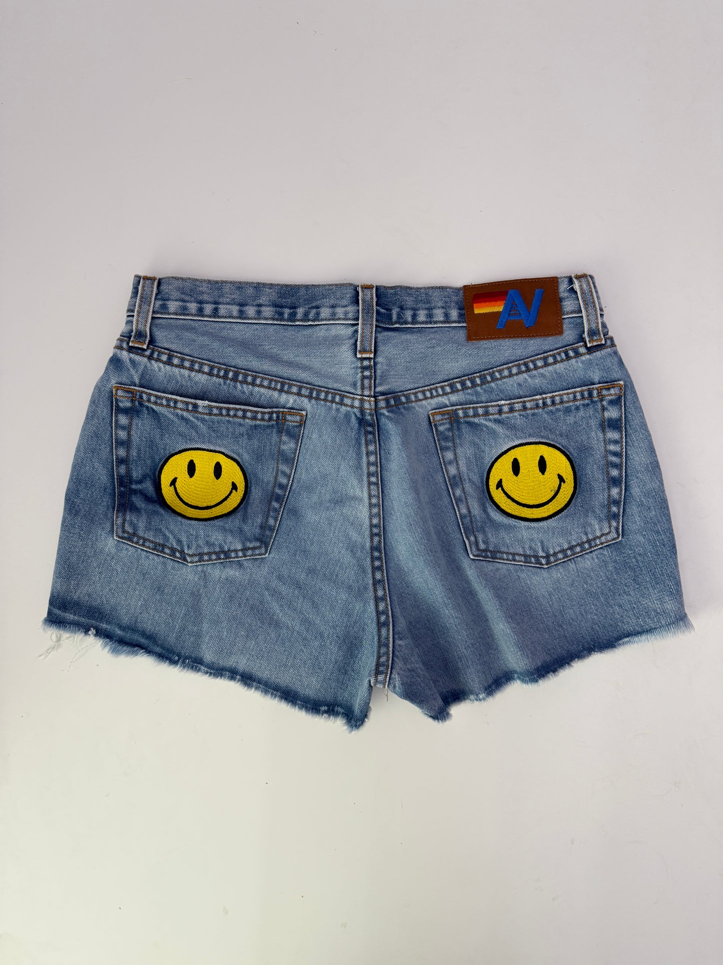 Aviator Nation mid rise rocker cowgirl keep smiling denim shorts (size 29)