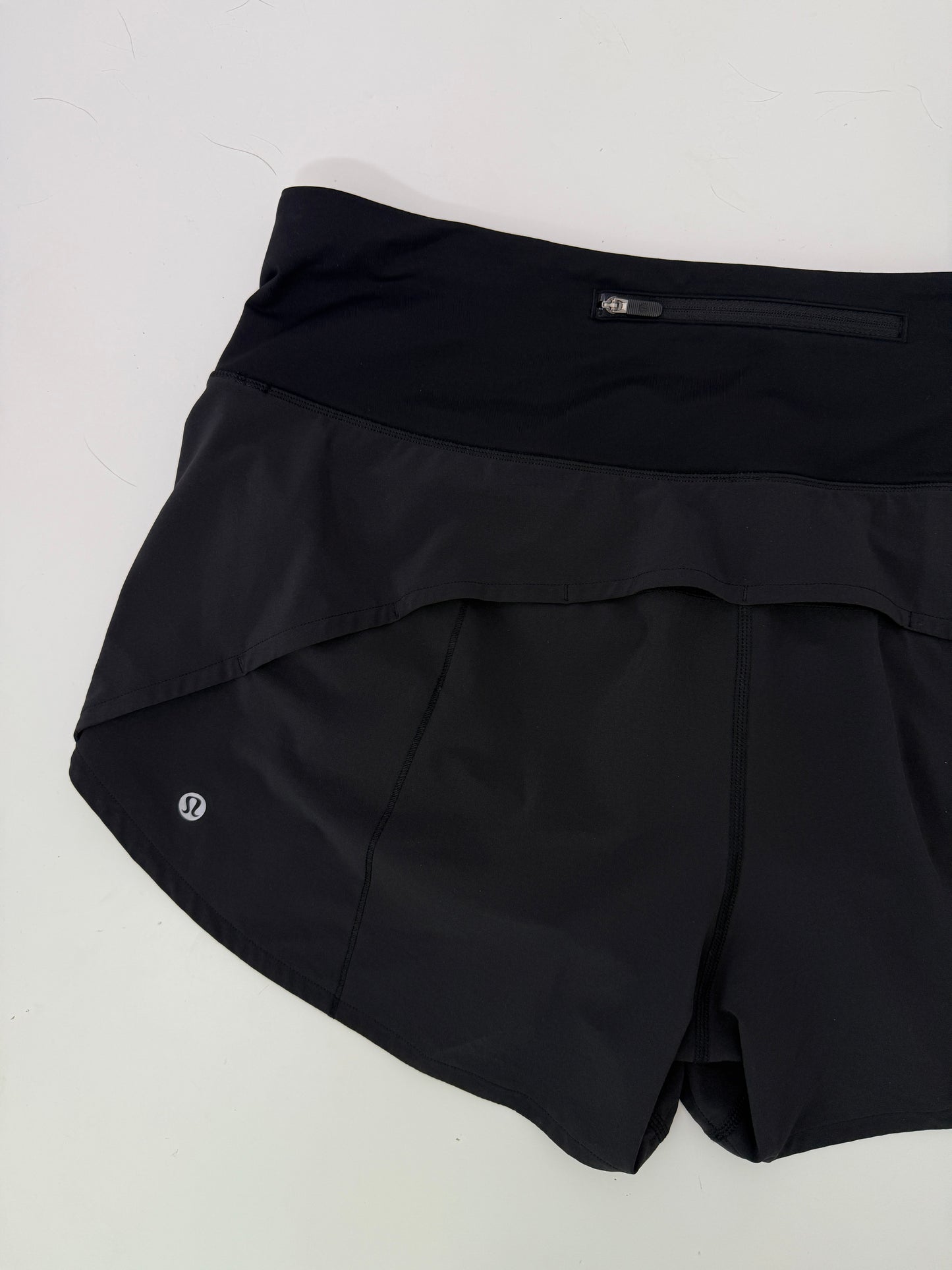 lululemon black high rise speed up shorts (size 12, 4" inseam)