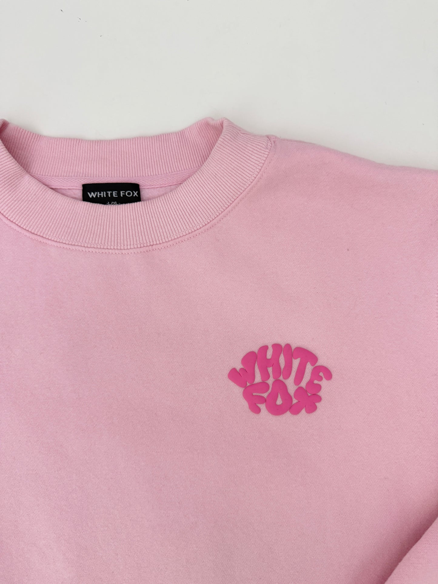 white fox pink crewneck (size L/XL)