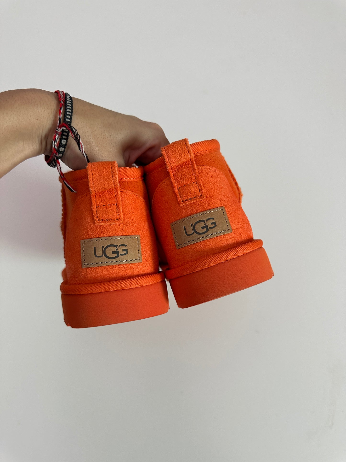 UGG ultra mini boot in orange (size W8)