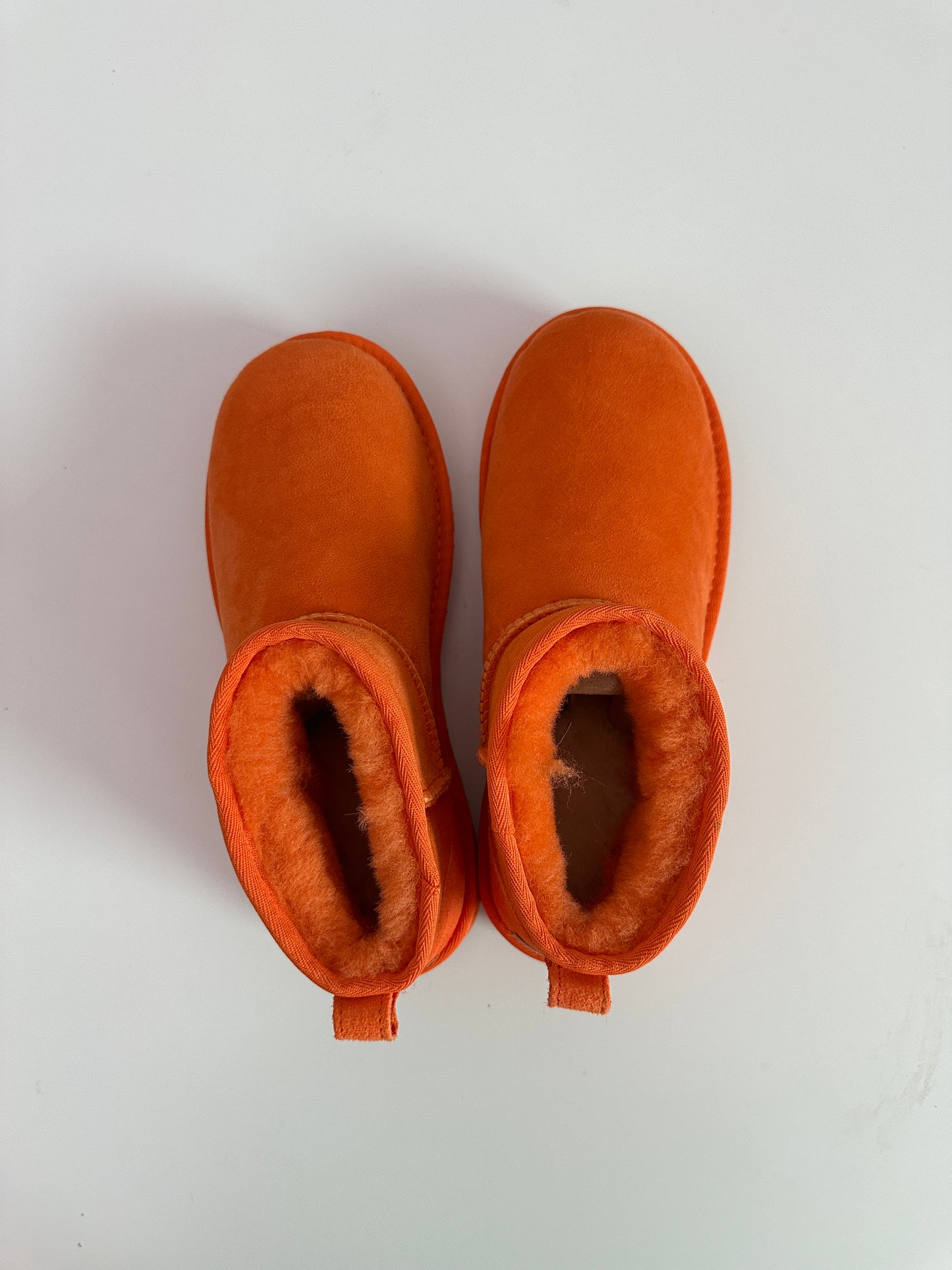 UGG ultra mini boot in orange (size W8)