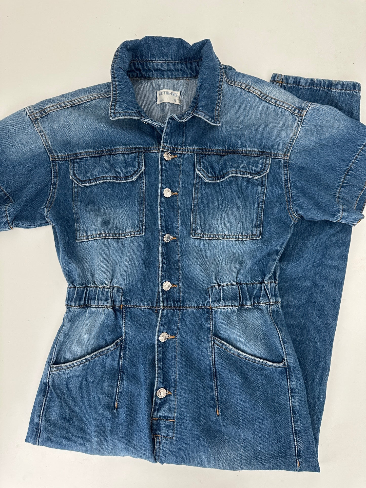 free people denim jumpsuit (size medium)