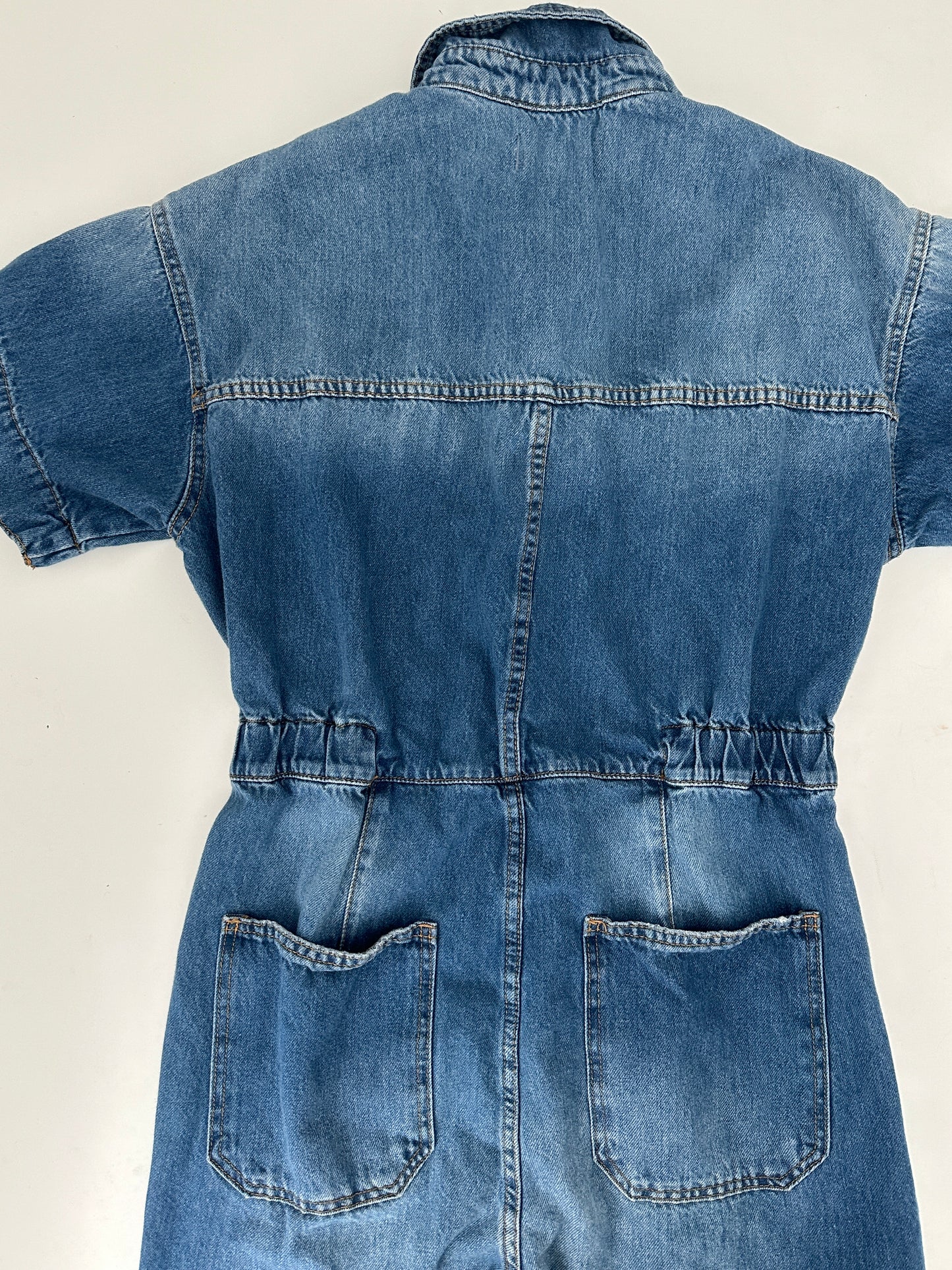 free people denim jumpsuit (size medium)