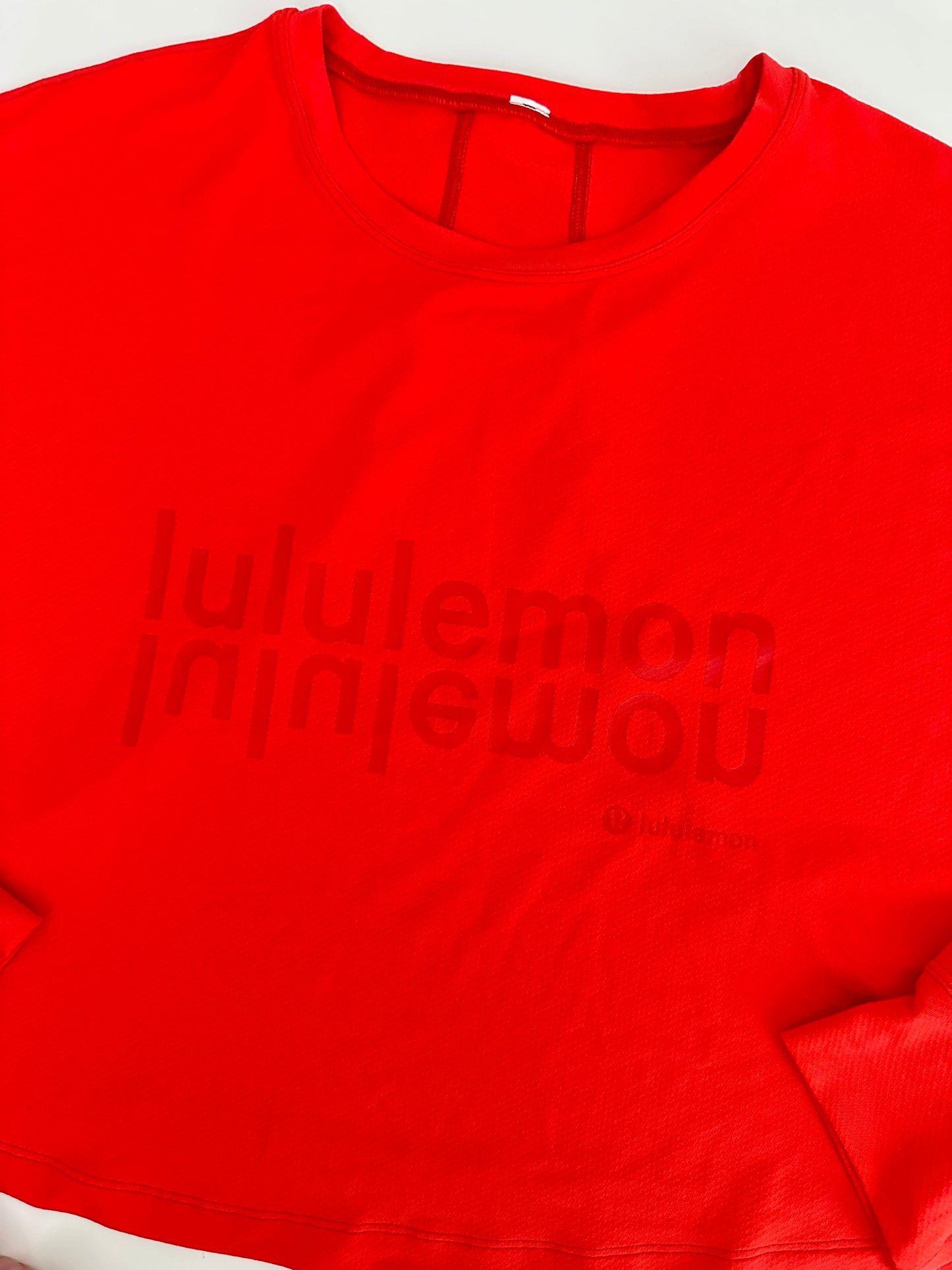 lululemon red logo muscle long sleeve - cropped length (size 6)