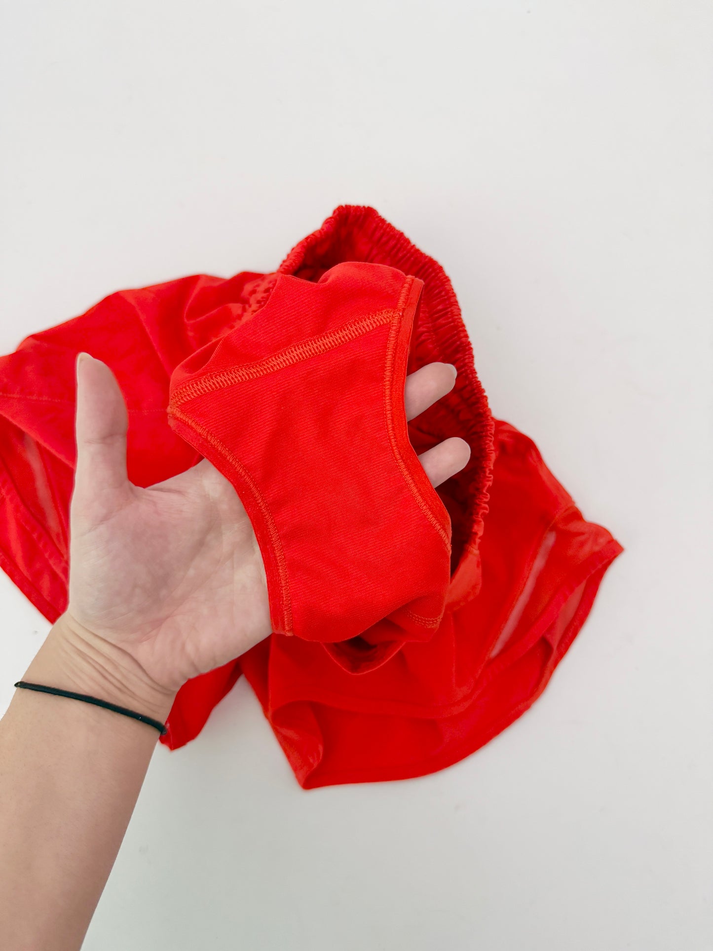 lululemon red high rise hotty hot shorts (size 2, 4" inseam)