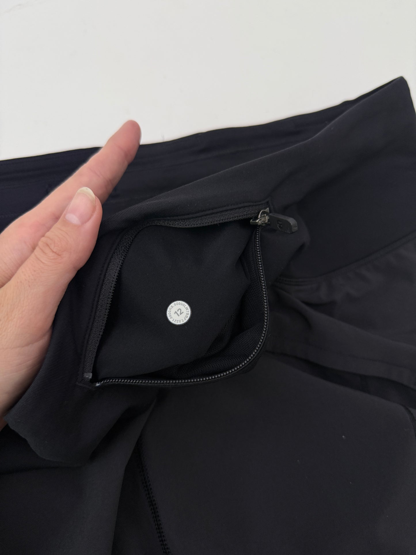 lululemon black high rise speed up shorts (size 12, 4" inseam)