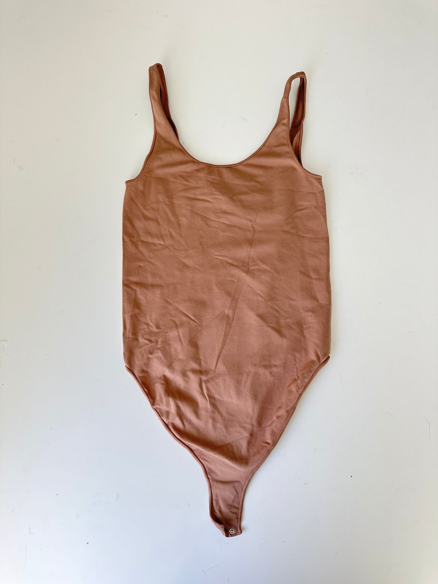 skims tan seamless bodysuit (size s/m)