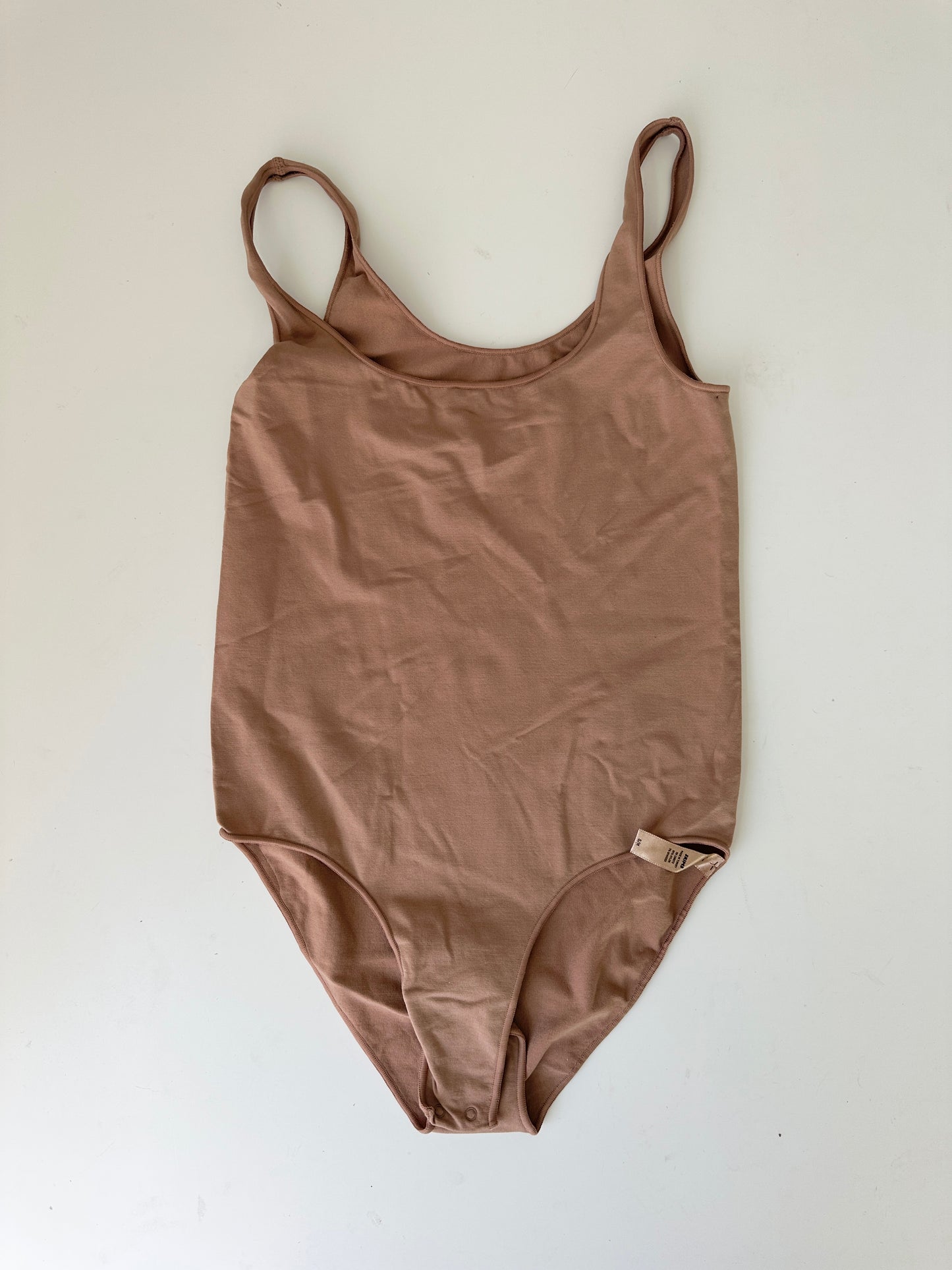 skims tan seamless bodysuit (size s/m)